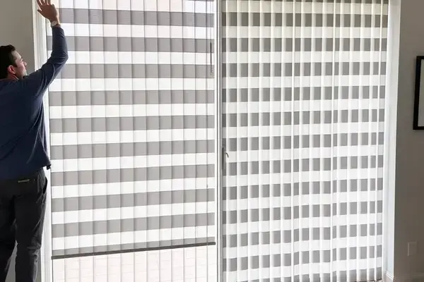 Professional installation of vertical blinds for large windows and sliding doors with excellent light control and privacy